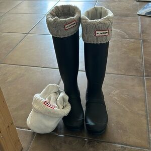 Tall Hunter rain boots with two pairs of Hunter socks